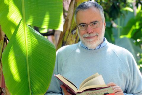 Andrea Riccardi with a book