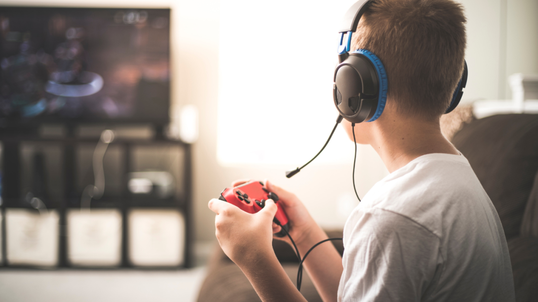 young person playing videogame