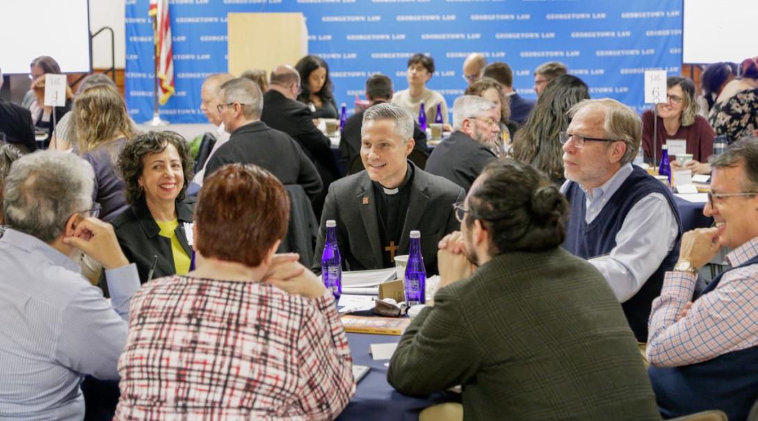 Group of people talking on a round table