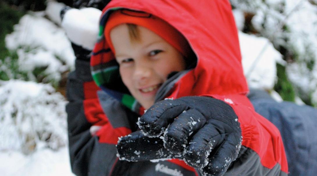 Child playing in the snow