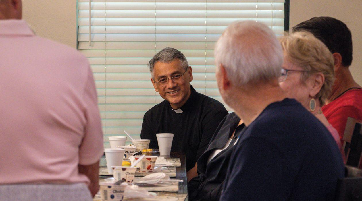 Rev sharing dinner with friends