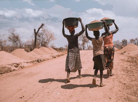 Women carrying food